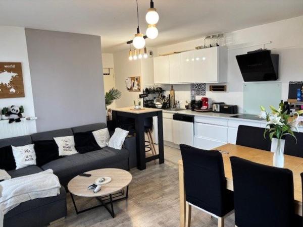 T4 moderne avec balcon et double parking