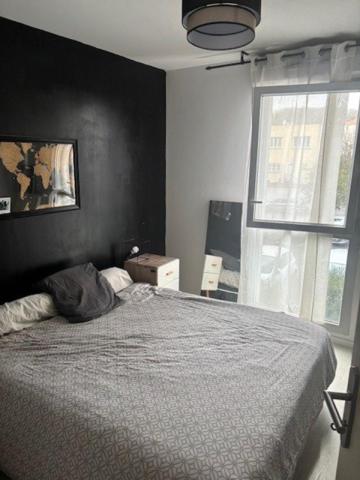 T4 moderne avec balcon et double parking