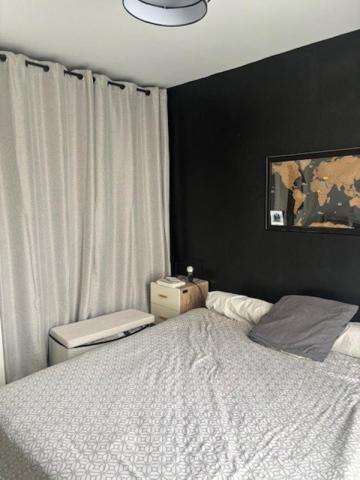 T4 moderne avec balcon et double parking
