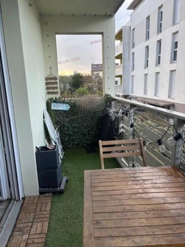 T4 moderne avec balcon et double parking
