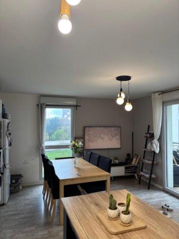 T4 moderne avec balcon et double parking