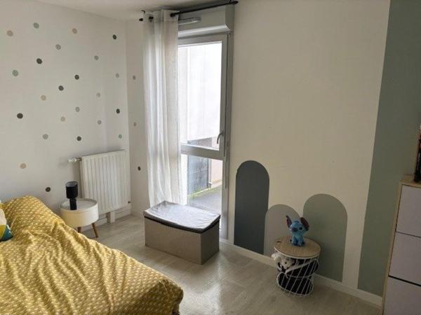 T4 moderne avec balcon et double parking