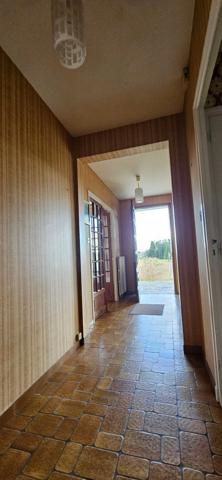 Maison plain-pied avec jardin, sous-sol, garage, 2 chambres