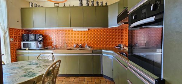 Maison plain-pied avec jardin, sous-sol, garage, 2 chambres