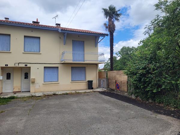 Maison de type T4 avec jardin et garage