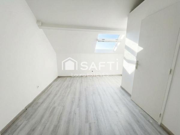 L'esprit maison de ville pour ce superbe appartement indépendant !