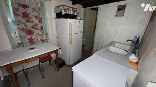 Maison d’habitation en pierre et masse entièrement à rénover 