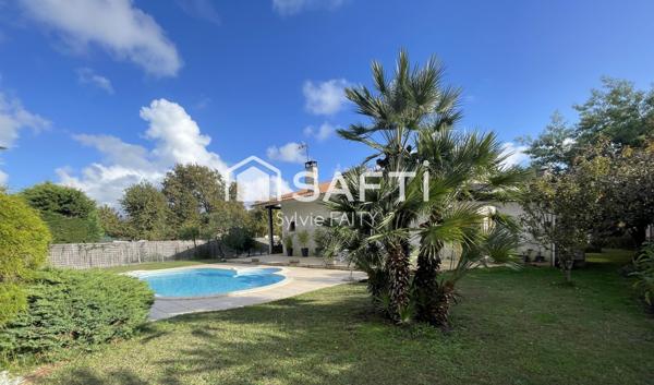 Maison T7 beaux volumes + dépendances dont local aménagé et double garage