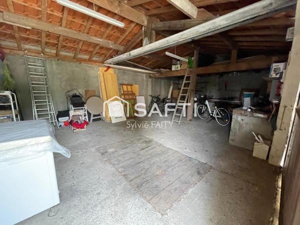 Maison T7 beaux volumes + dépendances dont local aménagé et double garage