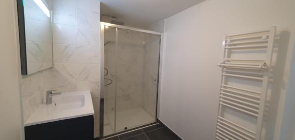 APPARTEMENT NEUF -2 CHAMBRES - JARDIN
