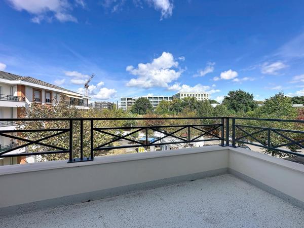 T2 avec balcon et place de parking