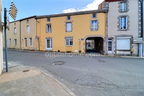 Maison de bourg rénovée de 99 m² (3 ch) avec cour, 2 garages + Appartement T2 loué (420 €/mois) – Centre-ville de Nueil-les-Aubiers (79250)