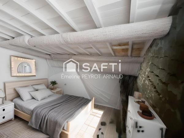 Maison en pierre à rénover au cœur du village de Quintenas