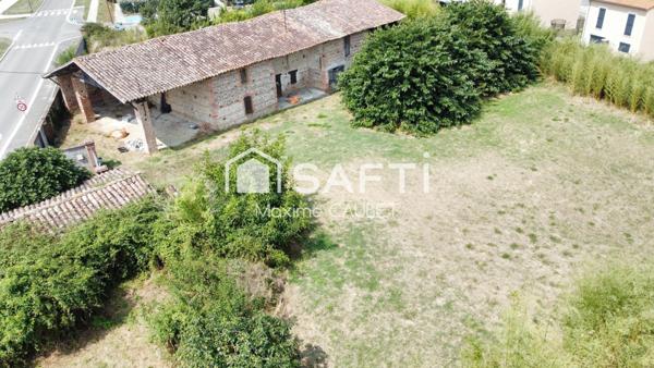 Terrain de 3 363 m² avec bâtisse ancienne à Merville