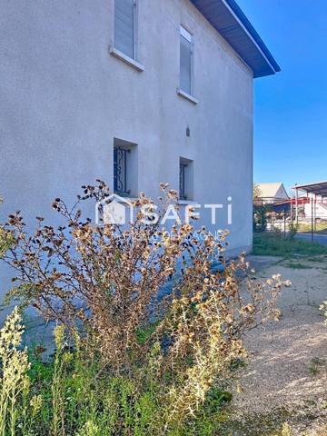 Maison de ville avec beau potentiel de rénovation