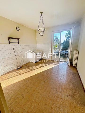 Maison de ville avec beau potentiel de rénovation