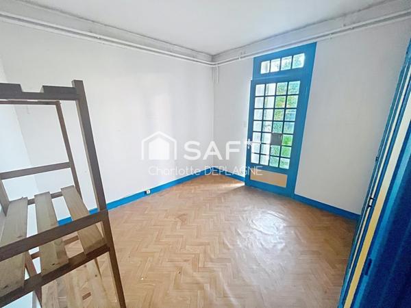 Maison de ville avec beau potentiel de rénovation