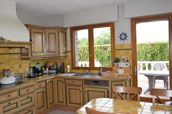 Maison de plein pied avec sous sol complet