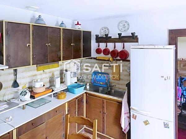 MAISON DE PLAIN-PIED AVEC JARDIN