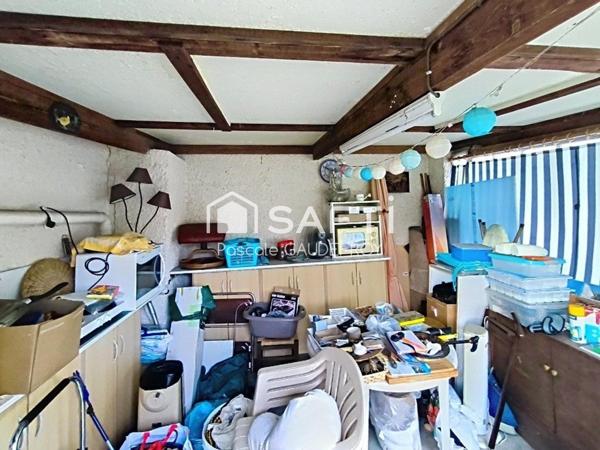 MAISON DE PLAIN-PIED AVEC JARDIN