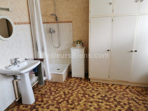 MAISON INDIVIDUELLE SEMI PLAIN-PIED 3 CHAMBRES 2 GARAGES JARDIN