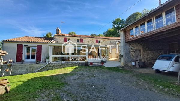 Maison spacieuse avec dépendances et jardin arboré