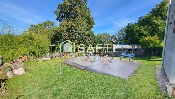 Maison spacieuse avec dépendances et jardin arboré