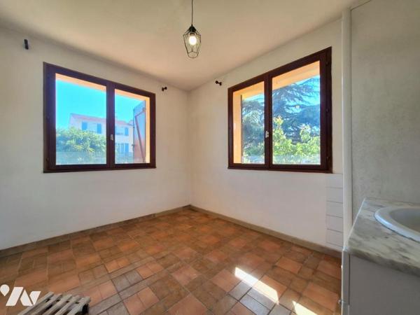 Maison traditionnelle avec 500m² de terrain. 