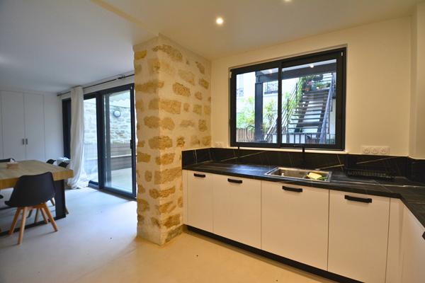 Appartement en souplex - pierres - terrasse