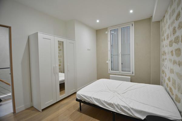 Appartement en souplex - pierres - terrasse
