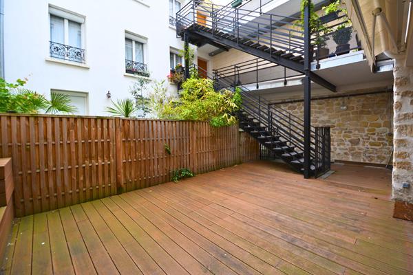 Appartement en souplex - pierres - terrasse
