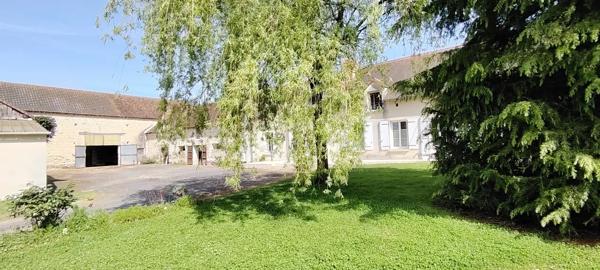 Corps de ferme avec 2 habitations et grange sur plus de 5000