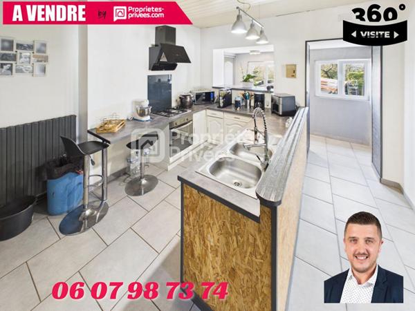 Grande maison avec terrain, garage et deux logements indépendants