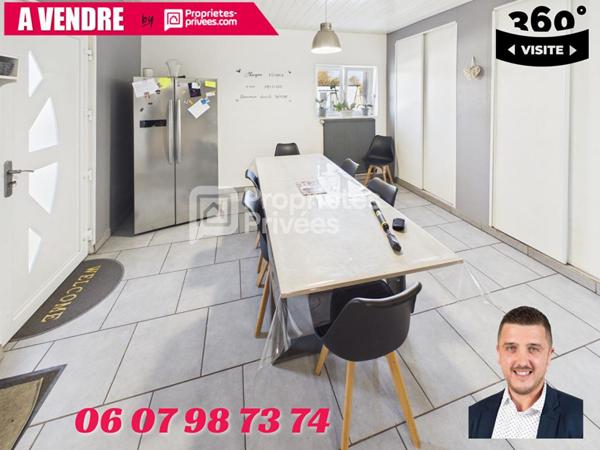 Grande maison avec terrain, garage et deux logements indépendants