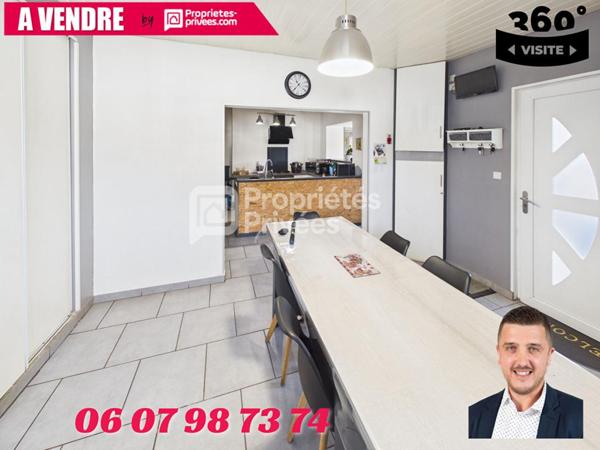 Grande maison avec terrain, garage et deux logements indépendants