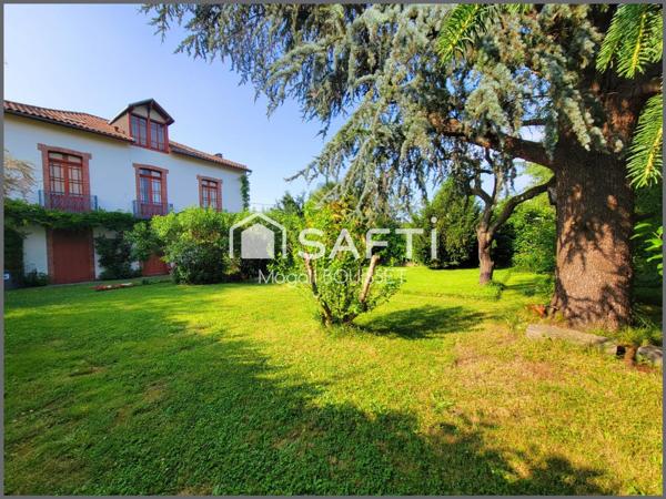 Maison à fort caractère de 232m², 4 chambres, bureau, combles, cave, garage, jardin