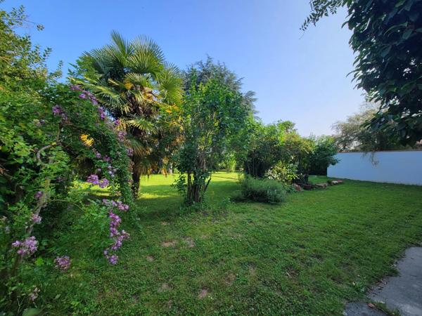 Maison à fort caractère de 232m², 4 chambres, bureau, combles, cave, garage, jardin