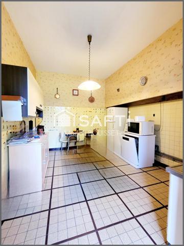 Maison à fort caractère de 232m², 4 chambres, bureau, combles, cave, garage, jardin