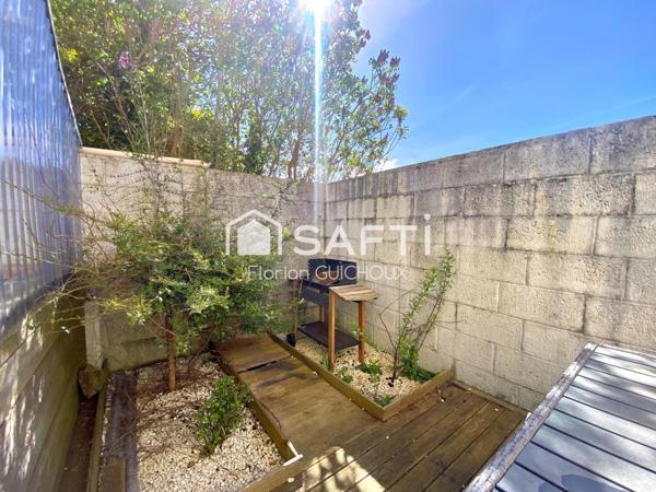 Maison de ville : 5 chambres, garage, terrasse ensoleillée. Opportunité d'investissement!