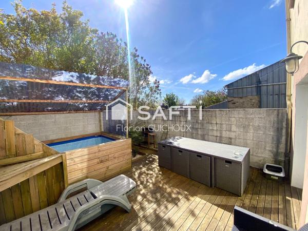 Maison de ville : 5 chambres, garage, terrasse ensoleillée. Opportunité d'investissement!