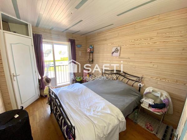 Maison de ville : 5 chambres, garage, terrasse ensoleillée. Opportunité d'investissement!