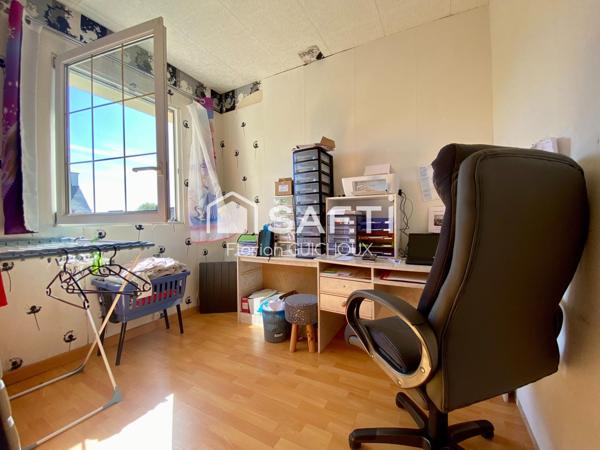 Maison de ville : 5 chambres, garage, terrasse ensoleillée. Opportunité d'investissement!