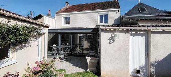 Élégante maison familiale et son jardin intime