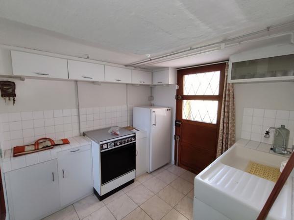 Maison sur sous-sol semi-enterré