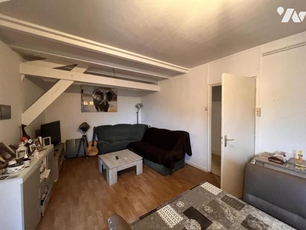 Immeuble 2 appartements + local commercial