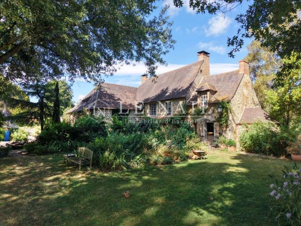 Charmant manoir avec remarquable parc sur 2.5 hectares dans le Maine
