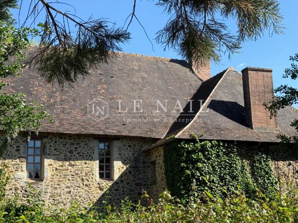 Charmant manoir avec remarquable parc sur 2.5 hectares dans le Maine
