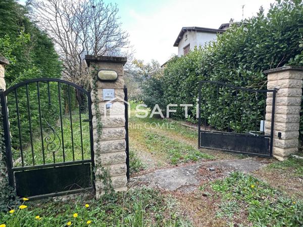 Maison Ancienne à rénover avec un grand terrain,Garage et cave!!