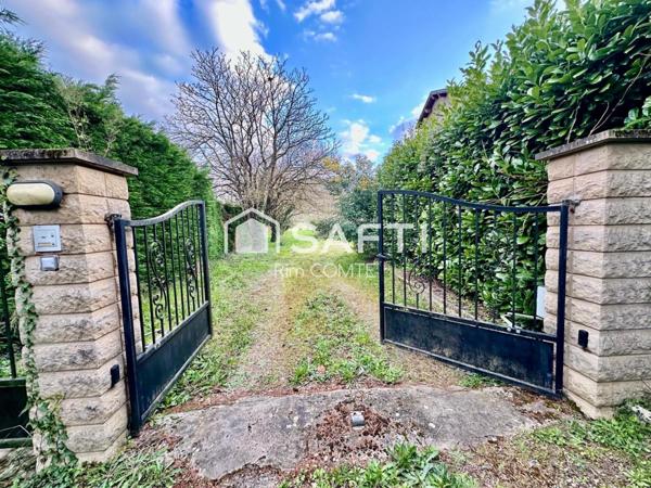 Maison Ancienne à rénover avec un grand terrain,Garage et cave!!