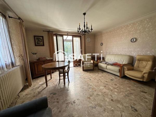 Maison Ancienne à rénover avec un grand terrain,Garage et cave!!